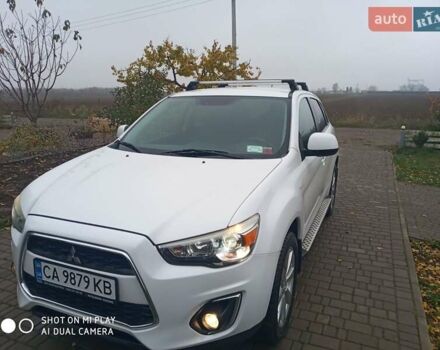 Белый Мицубиси Аутлендер, объемом двигателя 2 л и пробегом 203 тыс. км за 10750 $, фото 7 на Automoto.ua