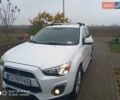 Белый Мицубиси Аутлендер, объемом двигателя 2 л и пробегом 203 тыс. км за 10750 $, фото 7 на Automoto.ua