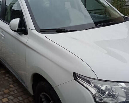 Білий Міцубісі Аутлендер, об'ємом двигуна 2.36 л та пробігом 112 тис. км за 14900 $, фото 1 на Automoto.ua