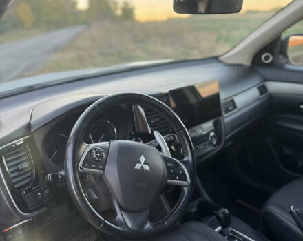 Белый Мицубиси Аутлендер, объемом двигателя 2.3 л и пробегом 250 тыс. км за 15000 $, фото 11 на Automoto.ua