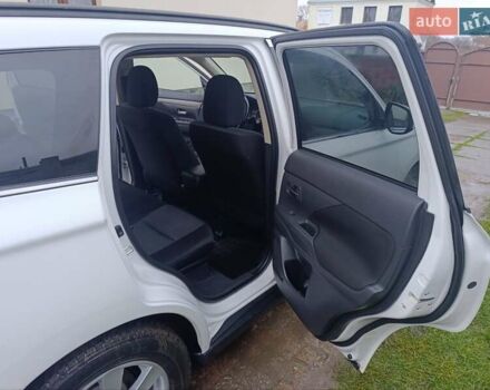 Белый Мицубиси Аутлендер, объемом двигателя 2.2 л и пробегом 278 тыс. км за 12600 $, фото 28 на Automoto.ua