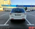 Белый Мицубиси Аутлендер, объемом двигателя 24 л и пробегом 208 тыс. км за 13900 $, фото 2 на Automoto.ua