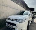 Білий Міцубісі Аутлендер, об'ємом двигуна 2.4 л та пробігом 260 тис. км за 10900 $, фото 4 на Automoto.ua