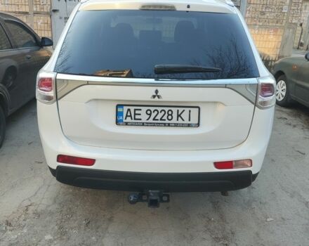 Белый Мицубиси Аутлендер, объемом двигателя 2.4 л и пробегом 248 тыс. км за 11500 $, фото 4 на Automoto.ua