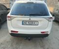 Белый Мицубиси Аутлендер, объемом двигателя 2.4 л и пробегом 248 тыс. км за 11500 $, фото 4 на Automoto.ua