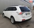 Білий Міцубісі Аутлендер, об'ємом двигуна 2 л та пробігом 245 тис. км за 12399 $, фото 4 на Automoto.ua