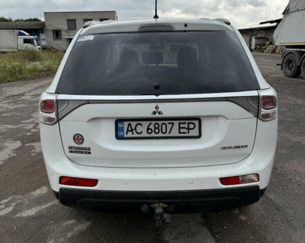 Белый Мицубиси Аутлендер, объемом двигателя 2.27 л и пробегом 183 тыс. км за 13000 $, фото 39 на Automoto.ua