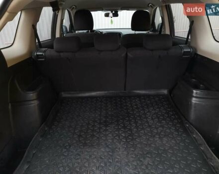 Білий Міцубісі Аутлендер, об'ємом двигуна 2 л та пробігом 245 тис. км за 12399 $, фото 7 на Automoto.ua