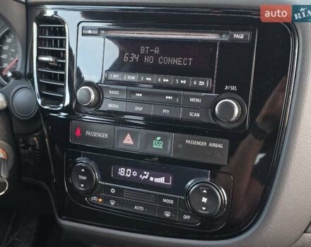 Белый Мицубиси Аутлендер, объемом двигателя 2.4 л и пробегом 183 тыс. км за 12499 $, фото 29 на Automoto.ua