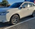 Белый Мицубиси Аутлендер, объемом двигателя 2.4 л и пробегом 175 тыс. км за 13800 $, фото 1 на Automoto.ua