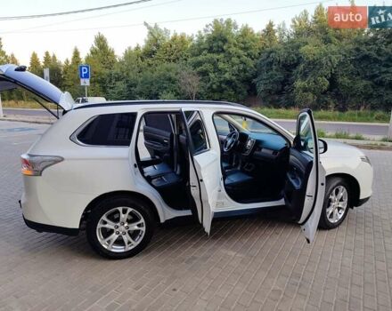 Белый Мицубиси Аутлендер, объемом двигателя 2.27 л и пробегом 200 тыс. км за 13999 $, фото 98 на Automoto.ua