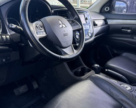 Белый Мицубиси Аутлендер, объемом двигателя 2.4 л и пробегом 147 тыс. км за 13500 $, фото 13 на Automoto.ua