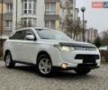 Белый Мицубиси Аутлендер, объемом двигателя 0 л и пробегом 180 тыс. км за 11500 $, фото 1 на Automoto.ua