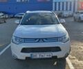 Белый Мицубиси Аутлендер, объемом двигателя 2.4 л и пробегом 175 тыс. км за 13800 $, фото 16 на Automoto.ua