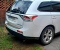 Белый Мицубиси Аутлендер, объемом двигателя 2.4 л и пробегом 230 тыс. км за 13500 $, фото 3 на Automoto.ua