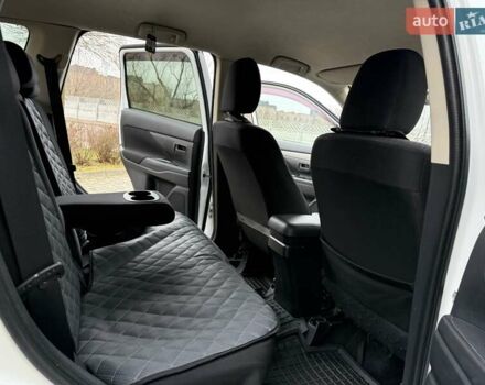 Белый Мицубиси Аутлендер, объемом двигателя 0 л и пробегом 180 тыс. км за 11500 $, фото 25 на Automoto.ua