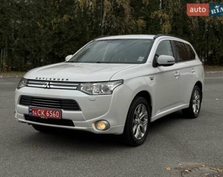 Белый Мицубиси Аутлендер, объемом двигателя 2 л и пробегом 210 тыс. км за 14300 $, фото 16 на Automoto.ua