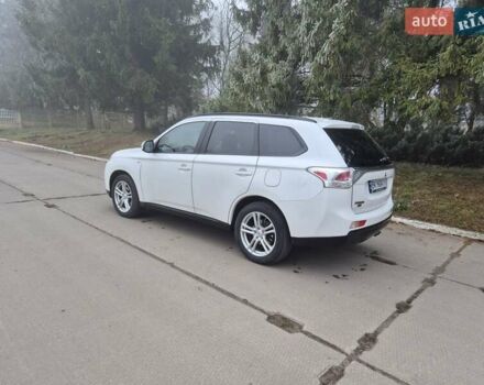 Белый Мицубиси Аутлендер, объемом двигателя 3 л и пробегом 173 тыс. км за 12700 $, фото 10 на Automoto.ua