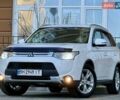 Белый Мицубиси Аутлендер, объемом двигателя 2.36 л и пробегом 140 тыс. км за 12999 $, фото 23 на Automoto.ua