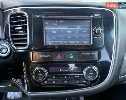 Белый Мицубиси Аутлендер, объемом двигателя 2.36 л и пробегом 140 тыс. км за 12999 $, фото 51 на Automoto.ua