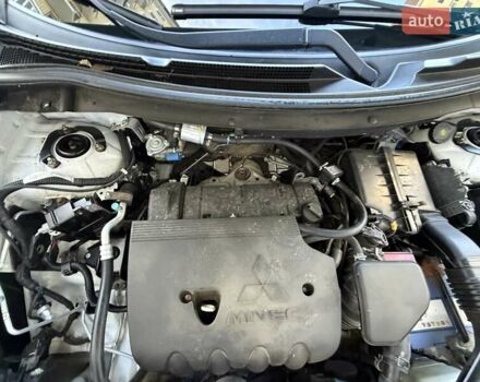 Белый Мицубиси Аутлендер, объемом двигателя 2.36 л и пробегом 140 тыс. км за 12999 $, фото 52 на Automoto.ua