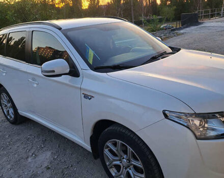 Белый Мицубиси Аутлендер, объемом двигателя 2 л и пробегом 143 тыс. км за 16300 $, фото 7 на Automoto.ua