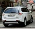 Белый Мицубиси Аутлендер, объемом двигателя 2.36 л и пробегом 140 тыс. км за 12900 $, фото 37 на Automoto.ua