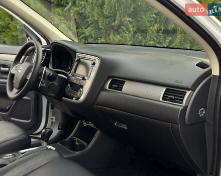 Белый Мицубиси Аутлендер, объемом двигателя 2.3 л и пробегом 214 тыс. км за 15499 $, фото 121 на Automoto.ua