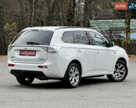 Белый Мицубиси Аутлендер, объемом двигателя 2 л и пробегом 210 тыс. км за 14300 $, фото 32 на Automoto.ua