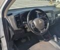 Белый Мицубиси Аутлендер, объемом двигателя 2 л и пробегом 299 тыс. км за 13999 $, фото 6 на Automoto.ua