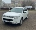 Белый Мицубиси Аутлендер, объемом двигателя 2.4 л и пробегом 201 тыс. км за 10000 $, фото 1 на Automoto.ua
