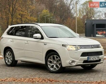Мицубиси Аутлендер 2014 в Дрогобыче на Automoto.ua Белый Мицубиси Аутлендер, объемом двигателя 2 л и пробегом 228 тыс. км за 15300 $, фото 8 на Automoto.ua