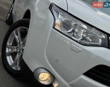 Белый Мицубиси Аутлендер, объемом двигателя 2.3 л и пробегом 214 тыс. км за 15499 $, фото 10 на Automoto.ua