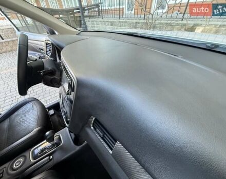 Белый Мицубиси Аутлендер, объемом двигателя 2.36 л и пробегом 140 тыс. км за 12999 $, фото 43 на Automoto.ua