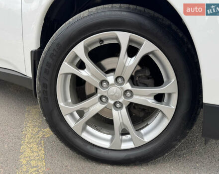 Белый Мицубиси Аутлендер, объемом двигателя 2.3 л и пробегом 214 тыс. км за 15499 $, фото 12 на Automoto.ua