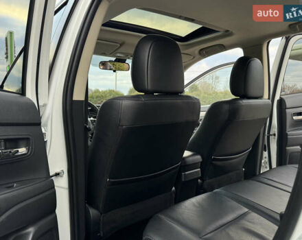 Белый Мицубиси Аутлендер, объемом двигателя 2.3 л и пробегом 214 тыс. км за 15499 $, фото 129 на Automoto.ua