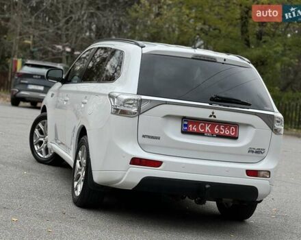 Белый Мицубиси Аутлендер, объемом двигателя 2 л и пробегом 210 тыс. км за 14300 $, фото 22 на Automoto.ua