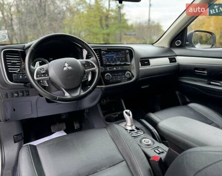 Белый Мицубиси Аутлендер, объемом двигателя 2 л и пробегом 210 тыс. км за 14300 $, фото 54 на Automoto.ua