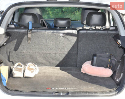 Белый Мицубиси Аутлендер, объемом двигателя 2 л и пробегом 132 тыс. км за 11500 $, фото 24 на Automoto.ua