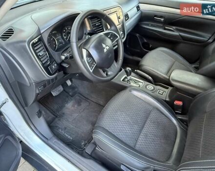 Белый Мицубиси Аутлендер, объемом двигателя 2.36 л и пробегом 140 тыс. км за 12999 $, фото 47 на Automoto.ua