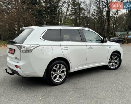 Белый Мицубиси Аутлендер, объемом двигателя 2 л и пробегом 210 тыс. км за 14300 $, фото 30 на Automoto.ua