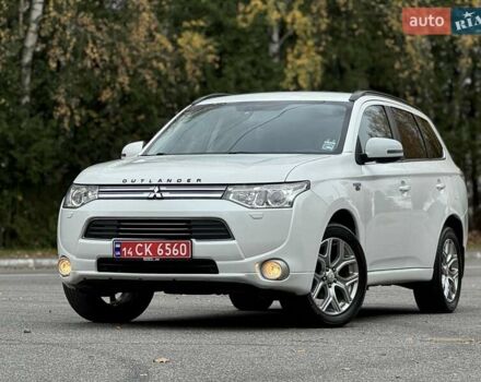 Белый Мицубиси Аутлендер, объемом двигателя 2 л и пробегом 210 тыс. км за 14300 $, фото 14 на Automoto.ua