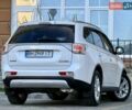Белый Мицубиси Аутлендер, объемом двигателя 2.36 л и пробегом 140 тыс. км за 12999 $, фото 6 на Automoto.ua