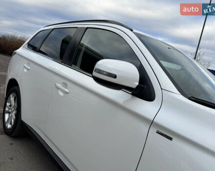 Белый Мицубиси Аутлендер, объемом двигателя 2.3 л и пробегом 214 тыс. км за 15499 $, фото 16 на Automoto.ua