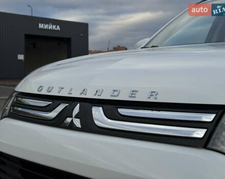 Белый Мицубиси Аутлендер, объемом двигателя 2.3 л и пробегом 214 тыс. км за 15499 $, фото 30 на Automoto.ua