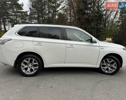 Белый Мицубиси Аутлендер, объемом двигателя 2 л и пробегом 210 тыс. км за 14300 $, фото 34 на Automoto.ua