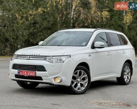 Белый Мицубиси Аутлендер, объемом двигателя 2 л и пробегом 210 тыс. км за 14300 $, фото 12 на Automoto.ua