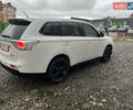 Белый Мицубиси Аутлендер, объемом двигателя 2 л и пробегом 216 тыс. км за 11300 $, фото 2 на Automoto.ua