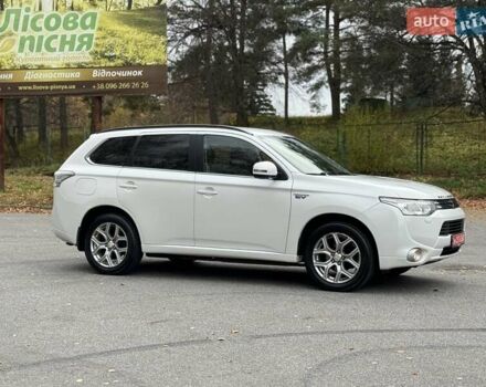 Белый Мицубиси Аутлендер, объемом двигателя 2 л и пробегом 210 тыс. км за 14300 $, фото 20 на Automoto.ua