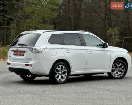Белый Мицубиси Аутлендер, объемом двигателя 2 л и пробегом 210 тыс. км за 14300 $, фото 31 на Automoto.ua